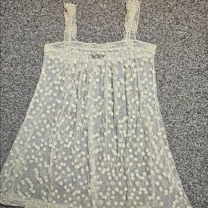 Cream Sleeveless Camisole with Pleated Embellishments